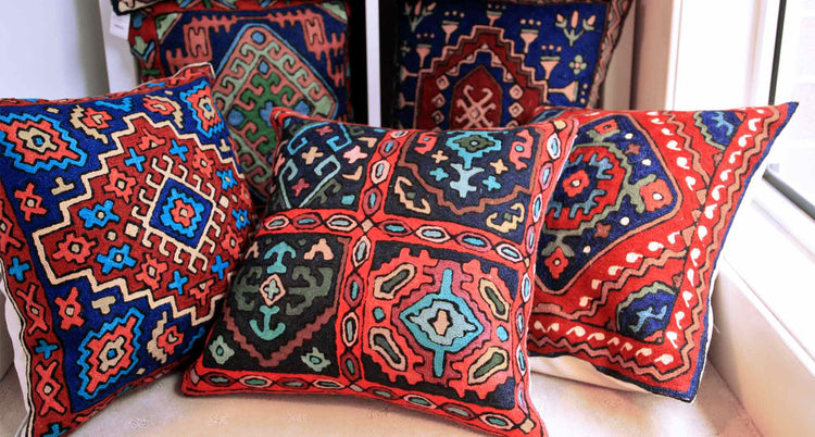 Kilim cushion covers handcrafted using earthy colours and traditional motifs are scattered throw pillow