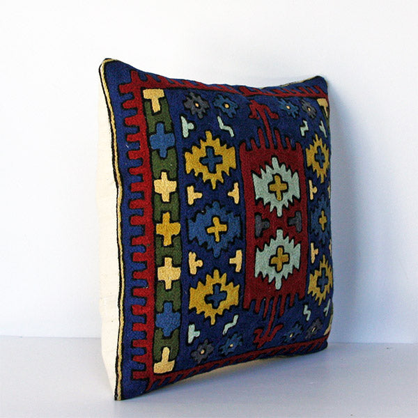 Cross motif kilim decorative cushion cover featuring eclectic and relaxed bohemian colors, textures, and patterns